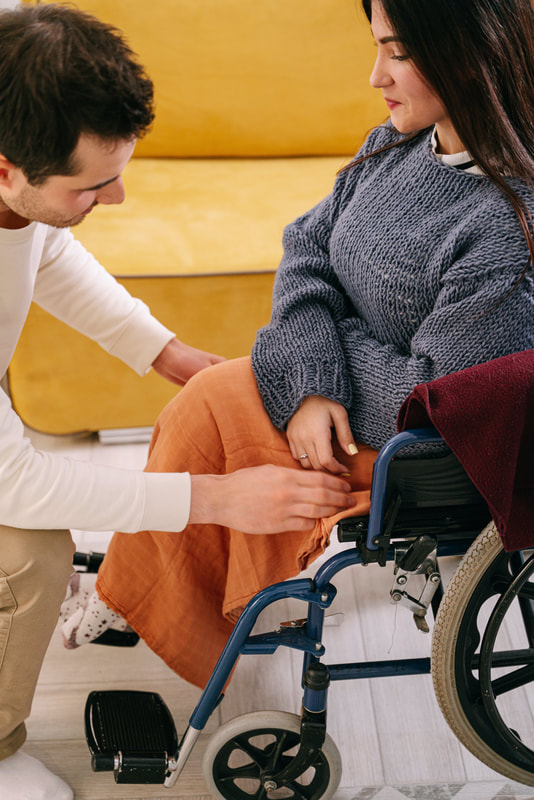 Caregiver caring for person with disability